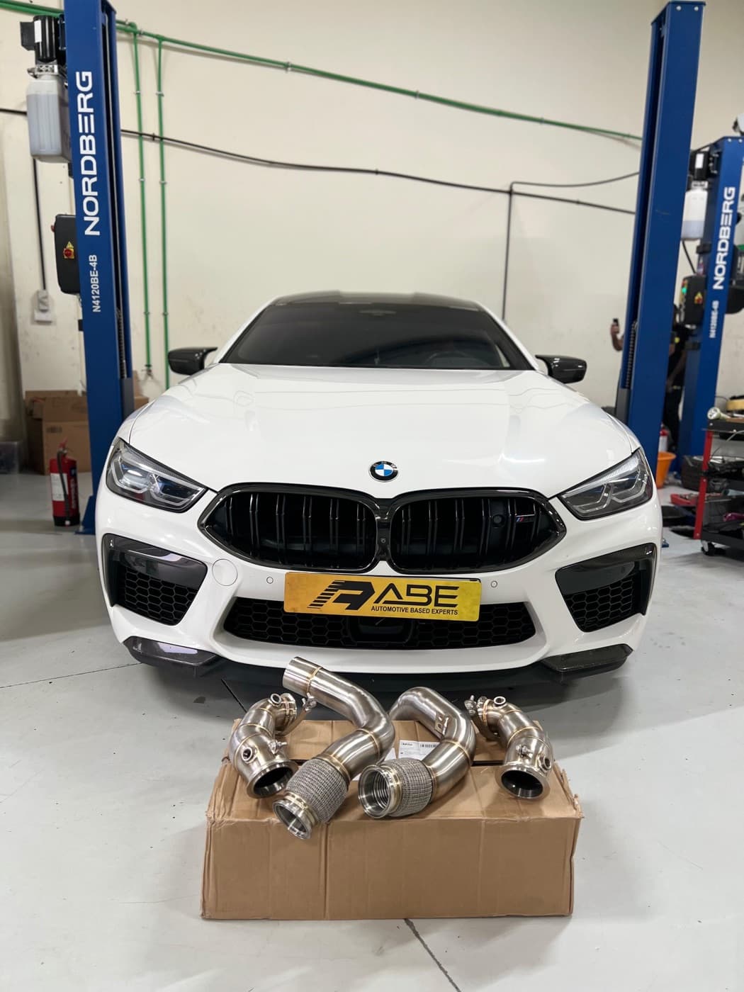 BMW M8 Competition with performance downpipes at ABE in Dubai